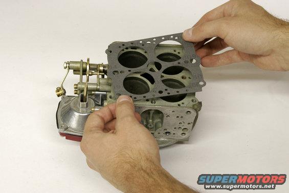 qft11.jpg Each rebuild kit contains gaskets for several sizes of carburetor, make sure to use the right size for the bores on your main body.