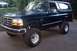 1994 Ford Bronco - This lifted 1994 Ford Bronco features large off-road tires and aftermarket wheels.