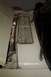 1968 Ford Mustang - A close-up view of a car's hood vent, showing its louvered design and chrome fasteners.