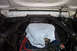 1968 Ford Mustang - The engine bay of a 1968 Ford Mustang shows the carburetor covered for protection.