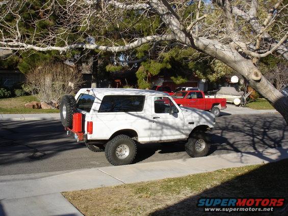 bronco-pics-003.jpg 35's with stock 15x7.5" 4" backspacing rims. The tires rubbed the radius arms pretty bad when turning in either direction. I decided to go with a 15x10 to move the wheel out a little farther also. 
