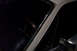 1968 Ford Mustang - A close-up view of a car's interior, focusing on the steering wheel and window trim.
