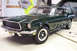 1968 Ford Mustang - A 1967 Ford Mustang Fastback is shown in a garage setting with a license plate that reads '11Z 194'.