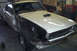 1968 Ford Mustang - A white 1967 Ford Mustang is shown in a garage, partially disassembled for restoration work.
