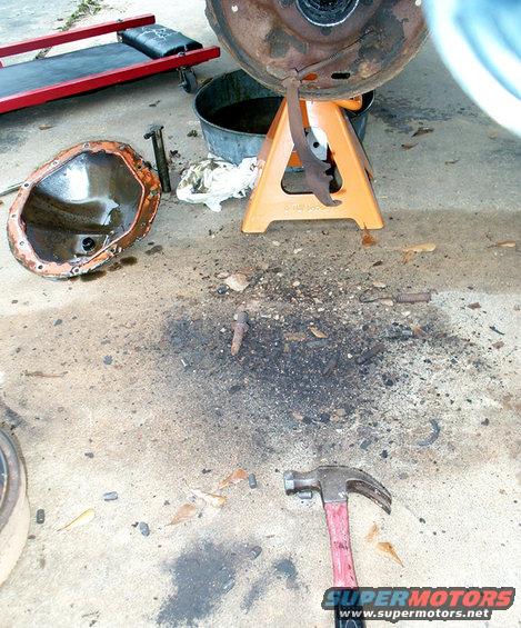 Differential cover and brake drum on jack stands with tools