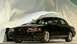 2003 Mercury Marauder - Front 3/4 view of a black 2003 Mercury Marauder sedan.