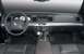 2003 Mercury Marauder - The interior of a 2003 Mercury Marauder features a dark dashboard with a prominent steering wheel and center console.