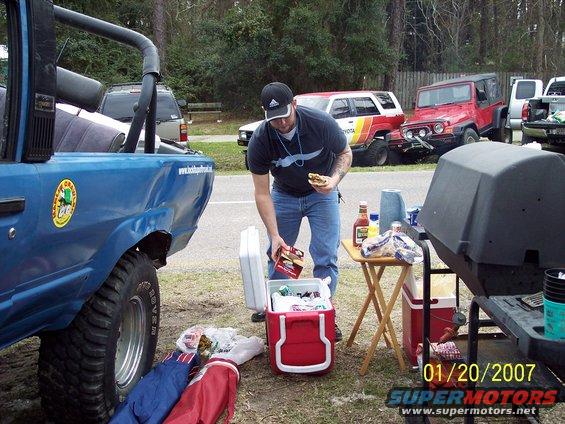 Side view of a blue 1984 Toyota 4Runner with off-road modifications