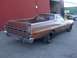 1972 Ford Ranchero - The rear quarter view of a brown 1972 Ford Ranchero shows its distinctive body style and chrome bumper.