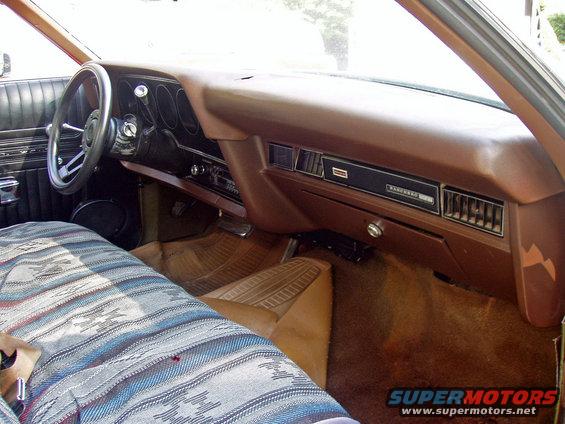 1972 Ford Ranchero interior with brown dashboard and patterned seat cover