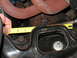 1985 Ford Crown Victoria LTD - A tape measure is used to check the clearance of an engine component.