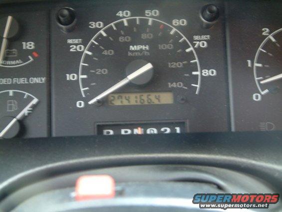 Dashboard gauges with odometer reading 274166.4
