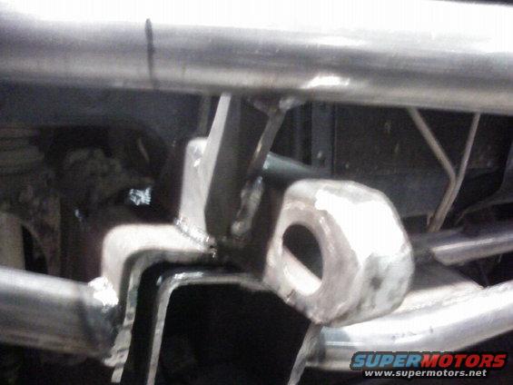 Close-up of a welded metal bracket, likely part of a custom bumper or frame modification