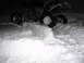 2005 Honda TRX 450 R - ATV navigating through deep snowdrifts.