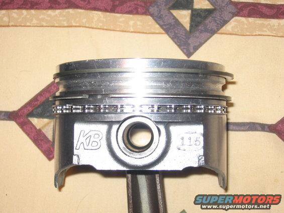 colins-parts-013.jpg KB hyperutectic pistons with rings and reman'd rods
side closeup
Jan. '07