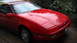 1989 Ford Probe - This red 1989 Ford Probe features pop-up headlights and a sunroof.