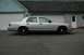 2003 Ford Crown Victoria - Silver 2003 Ford Crown Victoria parked on asphalt in front of a garage with white doors.