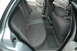 2003 Ford Crown Victoria - The interior of a 2003 Ford Crown Victoria shows gray cloth seats and carpeting.