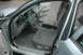 2003 Ford Crown Victoria - Interior view of a 2003 Ford Crown Victoria, highlighting the front seating area and dashboard.