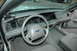 2003 Ford Crown Victoria - Interior view of a 2003 Ford Crown Victoria, highlighting the dashboard and seating area.
