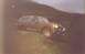 1989 Ford Bronco - This 1987 Ford Bronco navigates a steep, grassy incline under an overcast sky.