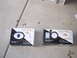 1996 Ford Probe - Two boxes of Total Mobile Audio speakers sit on a concrete surface.