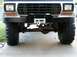 1978 Ford Bronco - Front view of a 1978 Ford Bronco, showing its bumper, winch, and off-road tires.