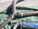 1996 Ford Probe - Exhaust system components, including pipes and a muffler, are shown on a green cloth.