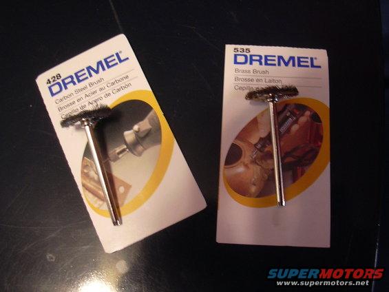 Two Dremel wire brushes, one carbon steel and one brass, in packaging