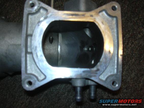 Close-up of a throttle body intake opening