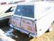 1973 Ford Ranchero - Rear view of a 1973 Ford Ranchero converted into a panel van, parked next to another vehicle.