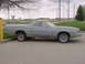 1973 Ford Ranchero - Side view of a gray 1973 Ford Ranchero parked outdoors.