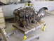 1973 Ford Ranchero - Engine removed from a car and sitting on a wooden pallet supported by jack stands.