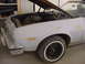 1973 Ford Ranchero - Front view of a 1972 Ford Ranchero, showing the fender, bumper, and open hood.