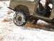 1979 Ford Bronco - This heavily modified 1978 Ford Bronco is shown in a snowy, off-road environment.