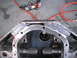 1991 Ford Bronco - Differential housing with axles and custom welded brackets, likely for a custom build.