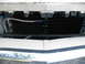 1985 Ford Crown Victoria LTD - The vehicle's front end shows an aftermarket oil cooler installed in front of the main radiator.