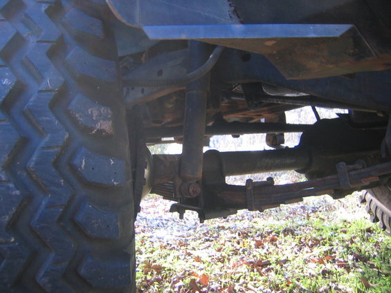Undercarriage and large tire of a vehicle
