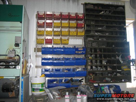 Garage interior with parts bins and shelves