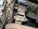 1996 Ford Bronco - This image shows the underside of a vehicle, focusing on the suspension system and exhaust pipe.