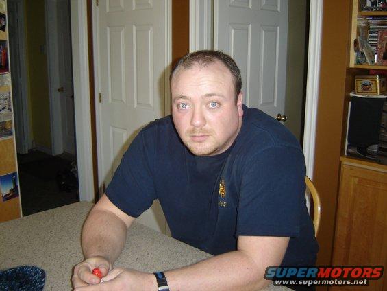 Man sitting at a table indoors