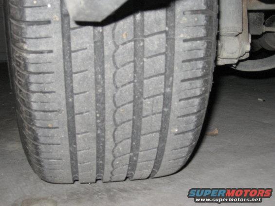 Close-up of a tire tread with visible wear