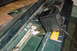1996 Ford Bronco - A space heater is used to warm up the repair area, same set up is used while the epoxy cures. Thermometer read over 120 degrees F.