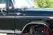 1979 Ford F-250 - This black 1979 Ford F-250 Ranger XLT features custom exhaust pipes visible under the fender.