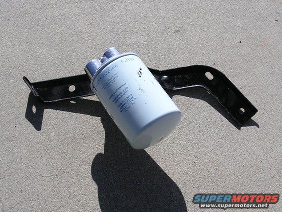 Bracket with remote filter installed