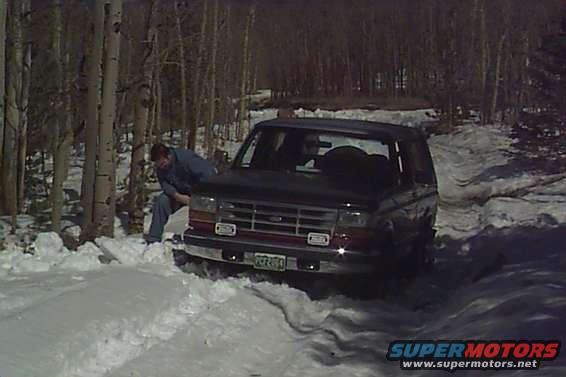 This is BroncoBob's truck. Boss74 is helping Bob dig it out after getting stuck all the way up to the frame.
I think he took more pics, so you'll have to see his page for them.