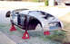 1959 MG A - Body shell of a 1959 MG A is on jack stands, ready for restoration work.