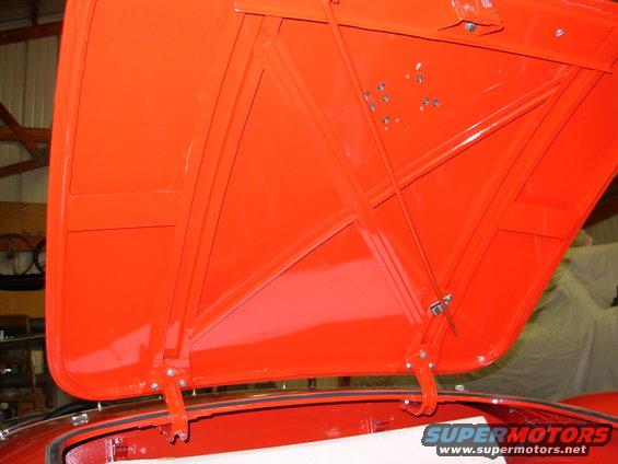 06hinges.jpg The flash is washing out some of the color. The car is actually very red.