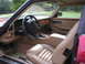 1992 Jaguar XJ-S - The interior of a 1992 Jaguar XJ-S features tan leather seats, wood trim, and a classic dashboard layout.