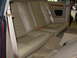 1992 Jaguar XJ-S - The interior of a 1992 Jaguar XJ-S shows tan leather rear seats and beige seatbelts.